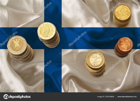 Metal euro coins of the EU currency against the background of the ...