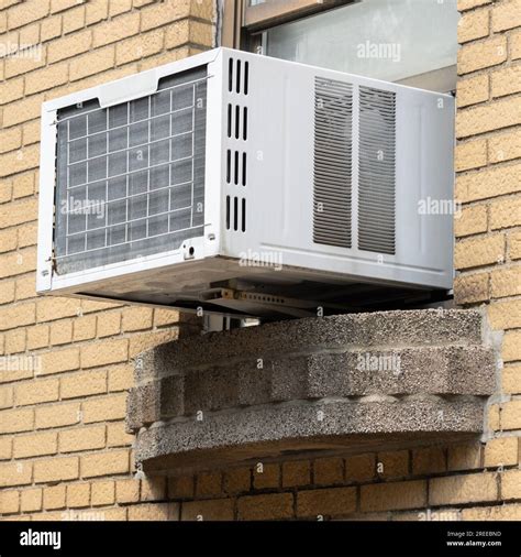 square cropped photo of an extra large air conditioner window unit ...