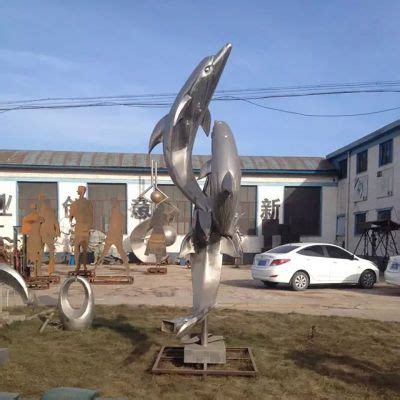 公园不锈钢浪花海豚雕塑-宏通雕塑