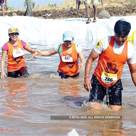 The winners of the competition during an obstacle race, held in ...
