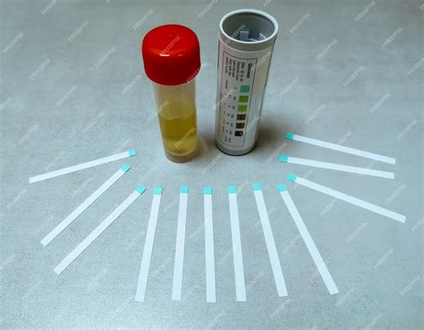 Premium Photo | Urine sample, test strip with bottle isolated for urinary glucose (sugar) testing