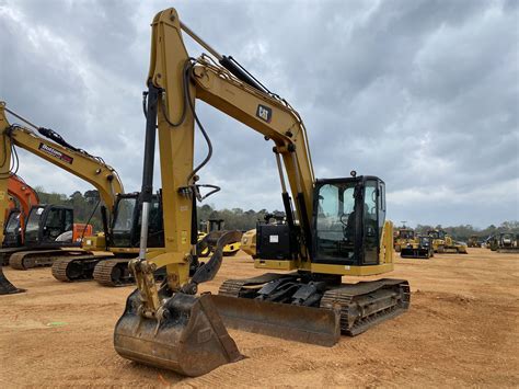 2019 CAT 310 Excavator - J.M. Wood Auction Company, Inc.