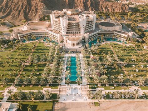https://dynamic-media-cdn.tripadvisor.com/media/photo-o/1b/05/37/16/al-bustan-palace-a-ritz.jpg?h=-1&s=1&w=1200&utm_source=chatgpt.com