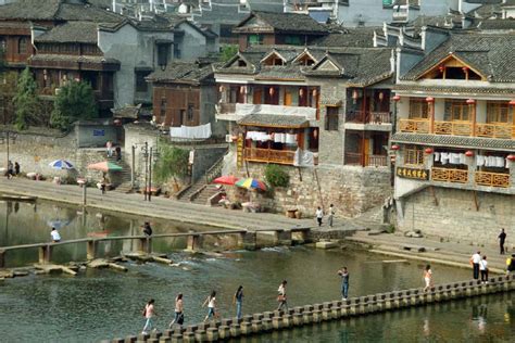 Fenghuang, Hunan, China Floating on Tuo River 沱江 throughout Fenghuang ...