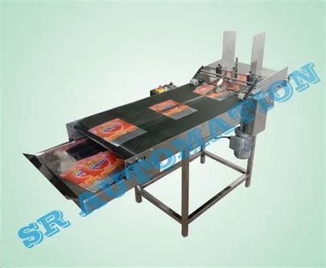 Batch Coding Machines - Pouch Feeder Machine Manufacturer from Ahmedabad
