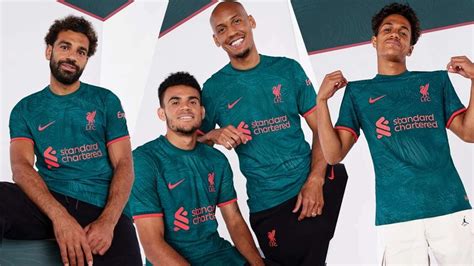 Wave your flag! Liverpool drop banner-inspired green and red third kit ...