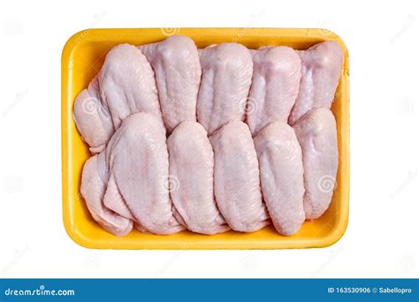 Raw and Uncooked Chicken Wings in a Yellow Container. Meat of Poultry ...