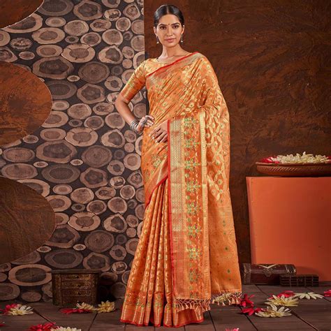 Orange Woven Organza Saree With Tassels