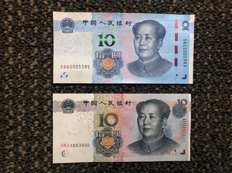 新2015版100元人民币纸币抢先看 防伪性能整体提升_央广网