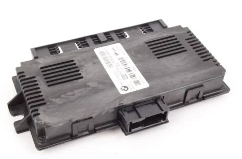 Image result for Mini Cooper Foot Well Module Replacement