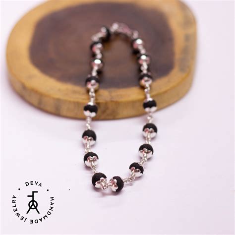 Karungali Bracelet 6mm with bead caps Silver – Devajeweller