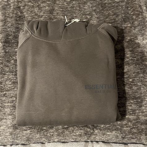 Grey essentials hoodie Size medium Brand new - Depop
