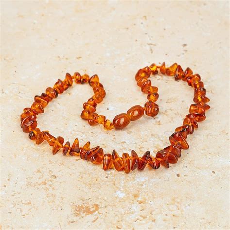 Teething necklaces: amber necklaces-chips cognac | Amber Heart