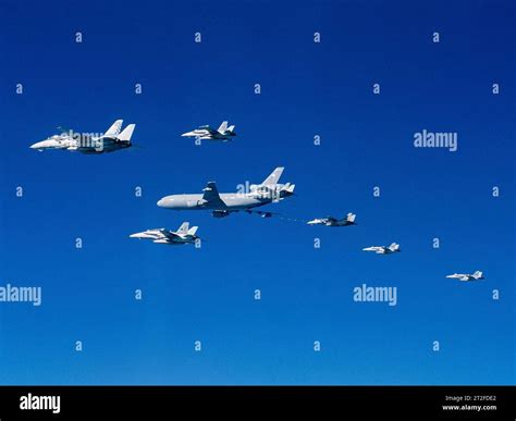 F-14s and F/A-18s refuel from a KC-10 during Operation Southern Watch ...