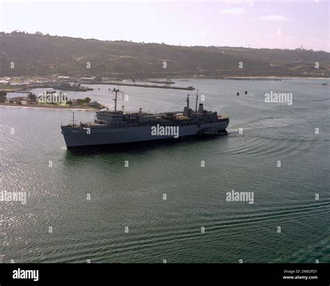An aerial port bow view of the submarine tender USS MCKEE (AS-41 ...
