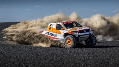 Download wallpaper 1366x768 toyota hilux, toyota, car, rally, dust ...
