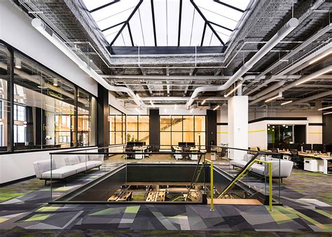 Modern office interior with open workspace, large windows, and stylish furnishings, suitable for Managed IT Services in Pennsylvania.