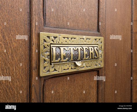Front door letterbox letters hi-res stock photography and images - Alamy