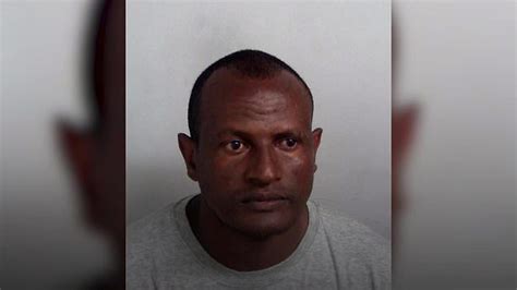 Asylum seeker freed in error from prison seen taking train to London