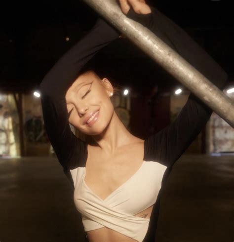 What does Ariana mean with this lyric: Boy, come on, put your lipstick ...