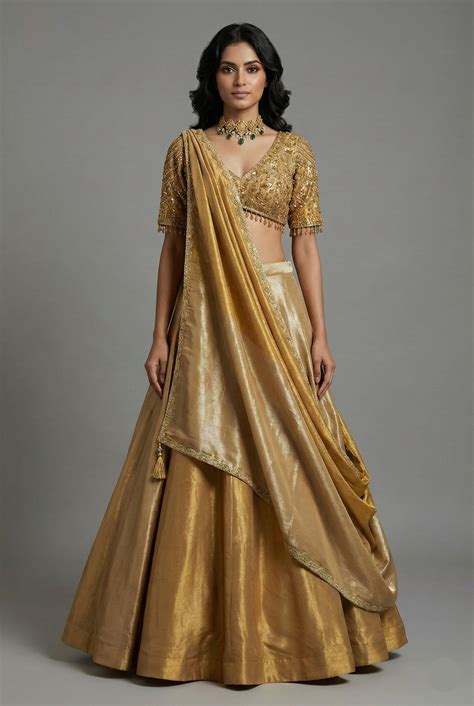 Golden Tissue Silk Plain Lehenga with Sequinned and Beaded Designer Bl ...