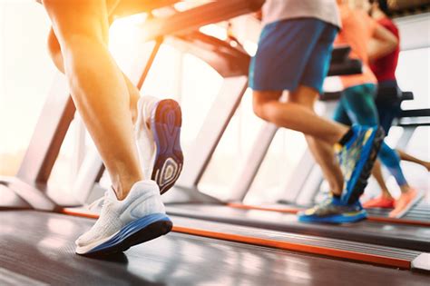 Picture Of People Running On Treadmill In Gym Stock Photo - Download ...