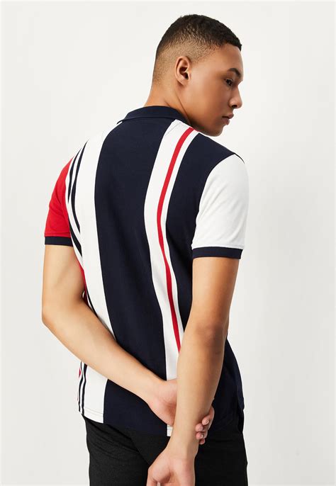 Buy Men Striped Slim Fit Polo T-shirt Online at just Rs. 699.0 ...