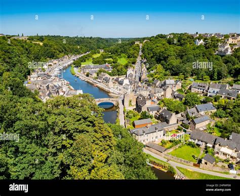Panoramic view of Dinan medieval town crossed by River Rance, Cotes d ...