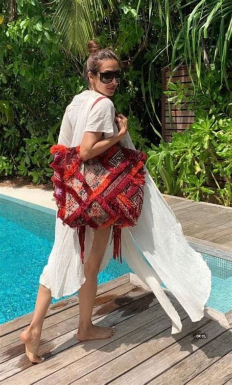 Malaika Arora sets the style bar high in bright yellow power suit, see ...