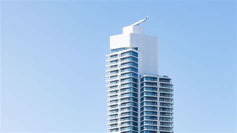 Wallpaper building, facade, white, sky hd, picture, image