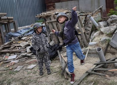 Dressed as soldiers, Ukrainian kids play amid war | Pics | IndiaToday