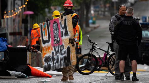 Police Clear Seattle’s Protest ‘Autonomous Zone’ - The New York Times