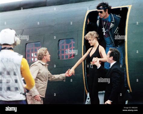 UNDER SIEGE, from left: Gary Busey, Erika Eleniak, Tommy Lee Jones ...