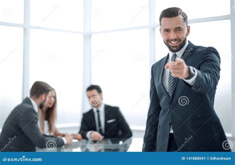 Group of People Standing in Office Pointing 的图像结果