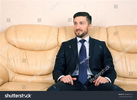 Suit Man Sitting 的图像结果