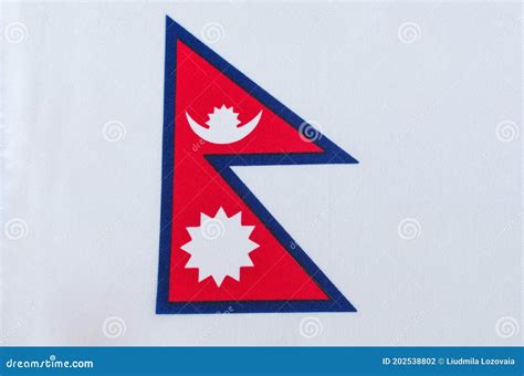 Tela De La Bandera Nacional De Nepal Foto de archivo - Imagen de ...