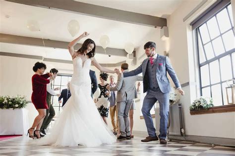 20 Wedding Group Dance Songs To Get Guests On The Floor!