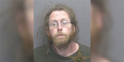 Man accused of driving off from crash scene with person on top of car ...