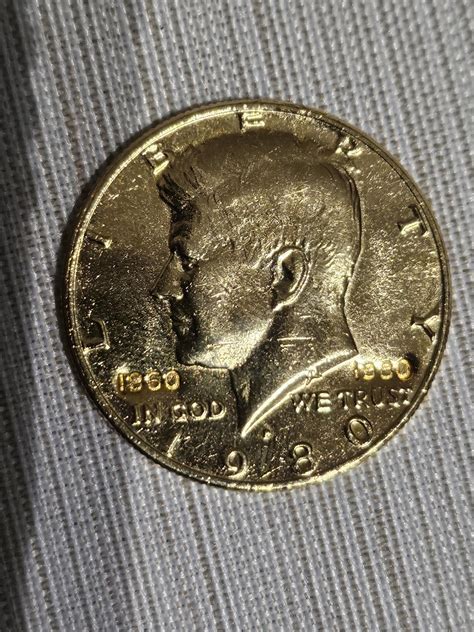 Gold plated 50 cent piece? : r/coins