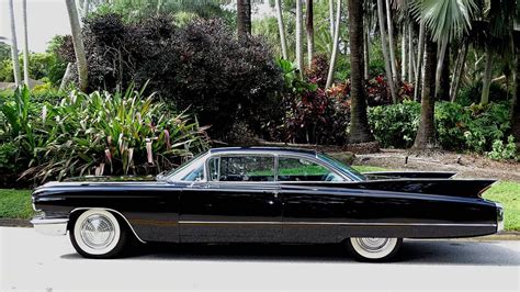 1960 Cadillac Coupe DeVille... Long, Shiny and Black : r/classiccars