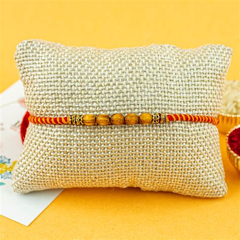 Send Beautiful Yellow Fins Rakhi Online in India at Indiagift.in