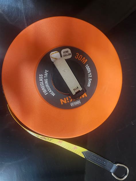 Wokin 100 Foot Fiberglass Tape Measure - Tool Mart Inc.