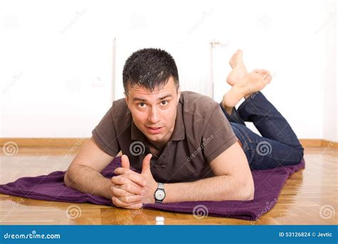 Man Lying On The Floor On Stomach Stock Photo - Image: 53126824