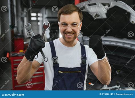 Portrait of a Smiling Fixing a Car Engine in His Garage Stock Photo ...