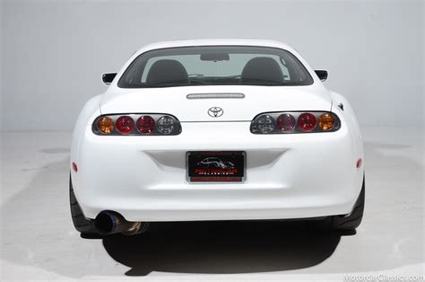 1997 Toyota Supra A80 Contrasts Super White With Black and a Little Pink This Summer - autoevolution