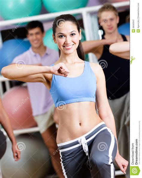 Sexy Female Coach Trains With Her Group Royalty Free Stock Photography ...