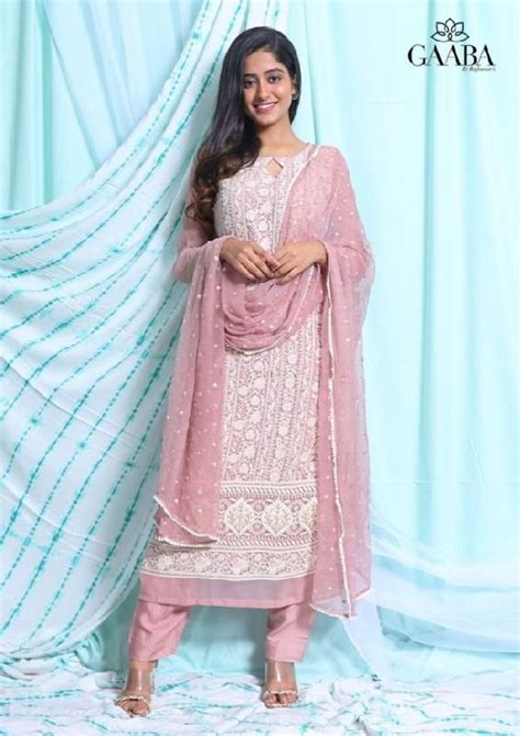 Shree Padma Merchants Pvt Ltd - Angelic Cream Kurti Flared Pant Set ...