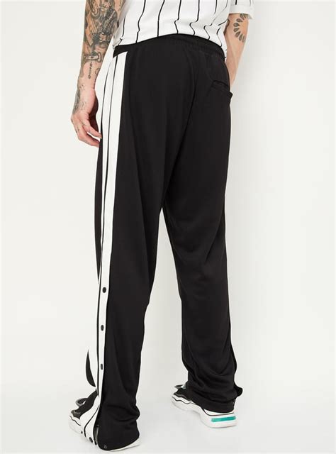 Buy Men Side Taped Track Pants Online at just Rs. 1199.0 ...