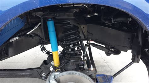 Installing Coil Spring Leveling Kit 2014 Ram 的图像结果