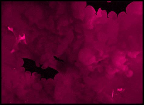 Every day is Halloween: Two bats flying in the pink sky